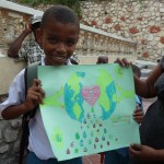 Haitian Boy shows his WAP drawing