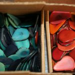 Tagua seeds thinly sliced, dyed and ready to be made into jewelry