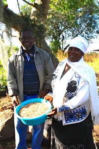 Biowatch’s Agro-Ecology Manager Lawrence Mkhaliphi with a farmer who has learned the value of seed saving. Photo Credit: IDEX